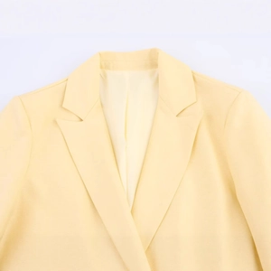 Women long casual light yellow blazer jacket with minimalist tailoring and notch lapels
