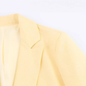 Women's cream yellow long casual suit jacket with peak lapel and textured twill fabric