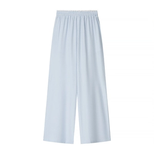 Detail of light blue striped wide-leg pants with elastic ruffled waist design