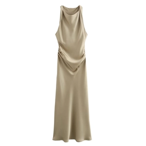 Detailed view of champagne gold satin maxi dress featuring elegant neck pleats and draped side