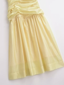 Elegant pale yellow pleated midi camisole dress with voluminous ruched bodice detail
