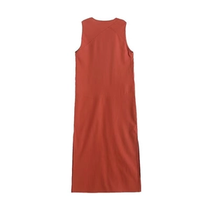 Detail view of caramel sleeveless maxi dress featuring back stitching and side slits