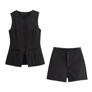 Detailed flat lay of black two-piece vest and shorts set with button-down vest and high waist