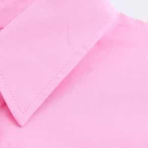 Detail of sharp collar and double stitching on pink short sleeve button-down shirt