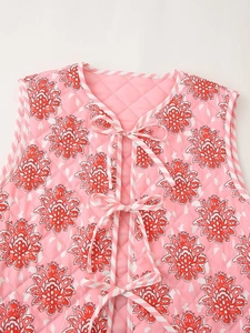 Pink floral quilted vest with sun flower prints and striped tie-front closure design