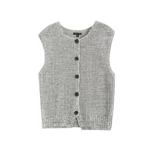 Detailed view of gray knit vest featuring thick knit texture and five dark buttons