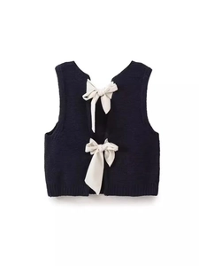 Gilet en tricot bleu marine pour femme avec dos ouvert et nœuds blancs élégants