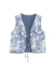 Quilted women's vest featuring vintage floral print with elephant patterns and front ties