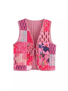 Pink patchwork quilted cotton vest with floral patterns and front lace-up closure