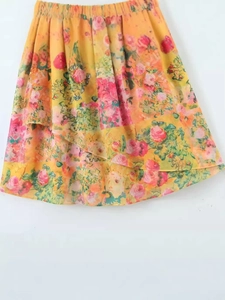 Summer yellow floral mini skirt with elastic waist and layered ruffles for beach vacation