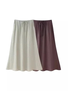 Women's 2-piece summer set featuring tie-up tank top and high-waist A-line maxi skirts