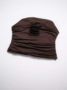 Dark brown strapless ruched top with 3D floral accents and side zipper detail