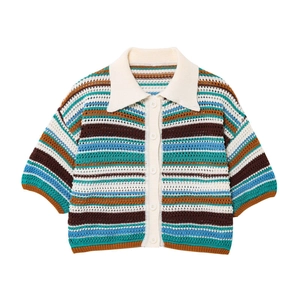 Close-up of the colorful striped knit texture and white pointed collar on the cardigan