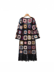Boho long crochet cardigan with colorful granny squares and black fringe tassels