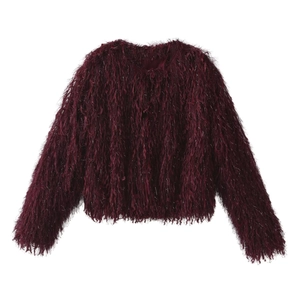 Detailed close-up of dark wine red faux fur coat with metallic trim and shimmering fibers