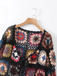 Handmade granny square crochet cardigan with colorful ethnic patterns on black base