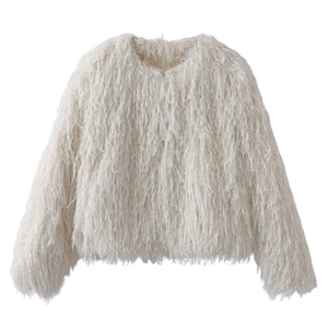 Detailed view of white faux fur jacket featuring plush long fibers and a round neckline