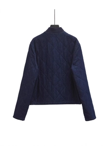 Women's dark blue quilted denim jacket with a high collar and diamond stitch pattern