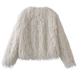 Close-up of the fluffy texture and shaggy white faux fur on a designer winter jacket
