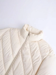Women's cream white quilted puffer jacket with stand collar and V-shaped stitching