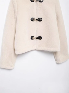 Women's cream white faux fur short cardigan jacket with black leather gold buckle detail