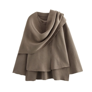 Brown loose knit sweater jacket with asymmetrical scarf neck detail and chunky texture