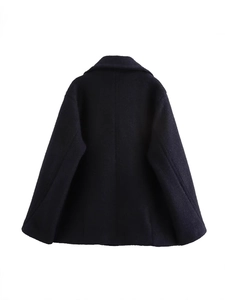 Back view of a classic wool-blend double-breasted coat with wide lapels and A-line silhouette