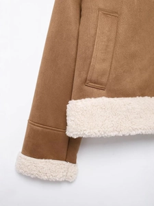 Brown suede winter jacket featuring warm white faux shearling lining and side pockets