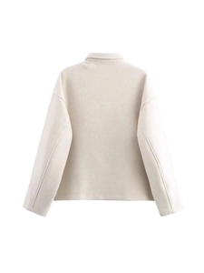 Back view of cream oversized short jacket with lapel collar and dropped shoulders