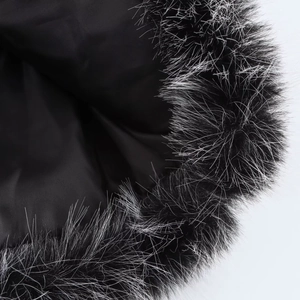 Detail of soft black and white faux fur collar on a winter cropped coat