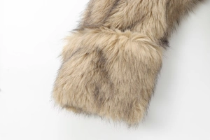 Detailed close-up showing the rich texture and fibers of the khaki faux fur collar trim