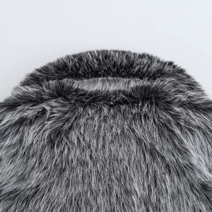 Close-up of thick silver fox faux fur collar with dense texture and soft gradient tones