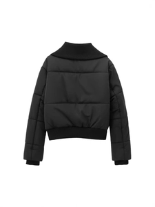 Women black cropped quilted jacket with ribbed collar and cuffs, back view on white base