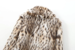 Close-up of leopard print faux fur coat collar showing dense and soft plush texture