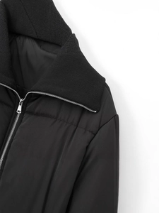 Women's slim black winter jacket with stand-up collar and premium ribbed knit detailing