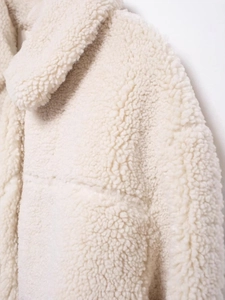 Women's cream fleece jacket with soft texture, lapel collar, and single-breasted design