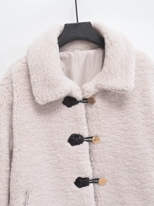 Chic beige faux shearling cropped jacket with elegant gold metal buttons and wide lapels
