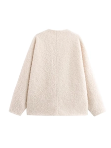 Back view of cream loose V-neck sherpa jacket in soft textured fleece material