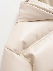 Detailed stitching and texture of cream white PU leather jacket with premium finishing