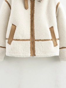Chic cream faux shearling jacket with brown leather trim and metal buckle collar
