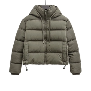Detail of army green hooded jacket showing drawstring hood and metal zipper closure