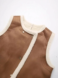 Women's brown faux suede vest with plush sherpa lining and metal snap closure