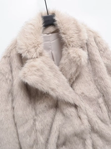 Elegant beige faux fur coat with a large lapel collar and soft satin lining