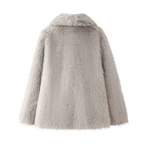 Detail shot of the back of a plush grey faux fur coat featuring a large lapel collar