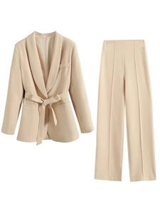 Elegant beige two-piece suit with belted blazer and high-waist wide-leg trousers for women