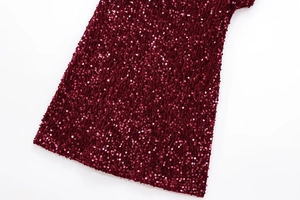 Close-up of wine red sequin embroidery details on a shiny Y2K mini party dress