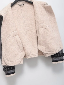 Women street fashion gray suede jacket with white lamb wool lining and strap details
