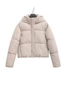 Chic beige hooded puffer jacket for women with stylish short cut and quilted design