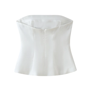 Detailed view of white tube top featuring vertical seams and hidden back zipper closure