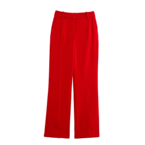 Detailed flat lay of vibrant red wide-leg trousers with elegant front pleat design